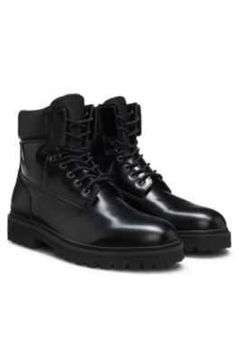Leather boots with cushioned collar and lug sole, Black