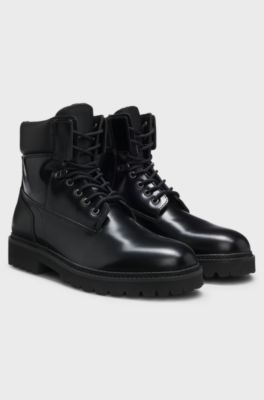 Leather boots with cushioned collar and lug sole, Black