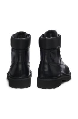 Leather boots with cushioned collar and lug sole, Black