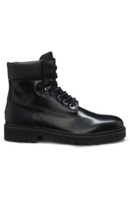 Leather boots with cushioned collar and lug sole, Black