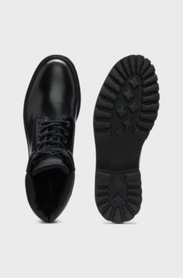 Leather boots with cushioned collar and lug sole, Black