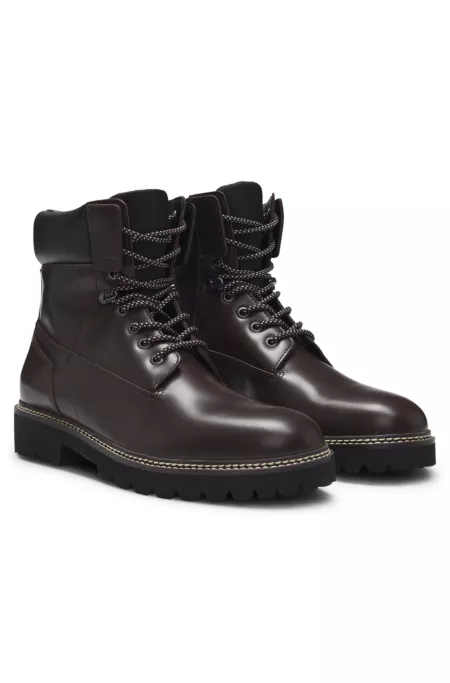 Leather boots with cushioned collar and lug sole