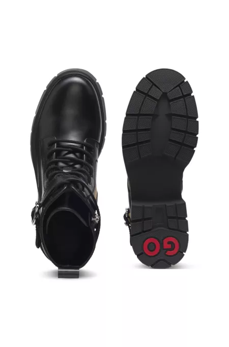 Faux-leather boots with buckled strap