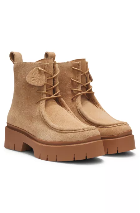 Lace-up boots in suede with removable logo tag