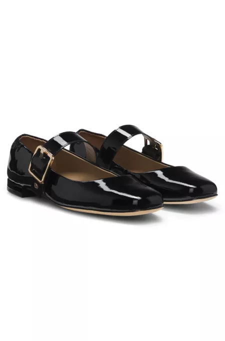 Patent-leather ballerina pumps with buckled strap