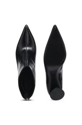 Ankle boots in leather with embossed logo, Black