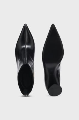 Ankle boots in leather with embossed logo, Black