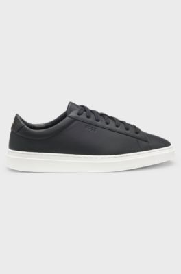 Cupsole trainers in leather with signature-stripe stitching, Black