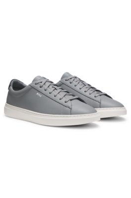 Cupsole trainers in leather with signature-stripe stitching