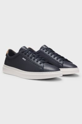 Cupsole trainers in leather with signature-stripe stitching, Dark Blue