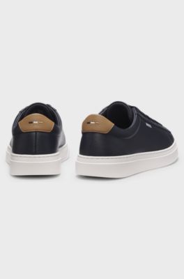 Cupsole trainers in leather with signature-stripe stitching, Dark Blue