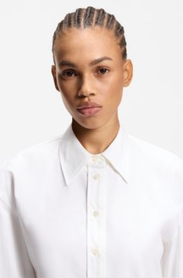 Camicetta relaxed fit con orlo a peplo, Bianco