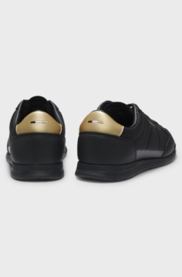 Mixed-material trainers with contrast back tab, Black