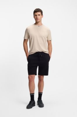 Mixed-material trainers with contrast back tab, Black