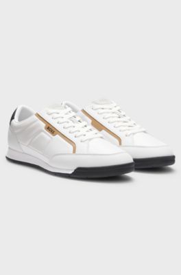 Mixed-material trainers with contrast back tab, White
