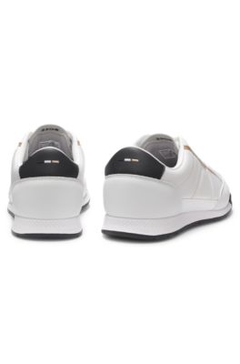 Mixed-material trainers with contrast back tab, White