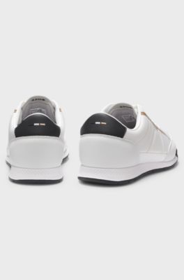 Mixed-material trainers with contrast back tab, White