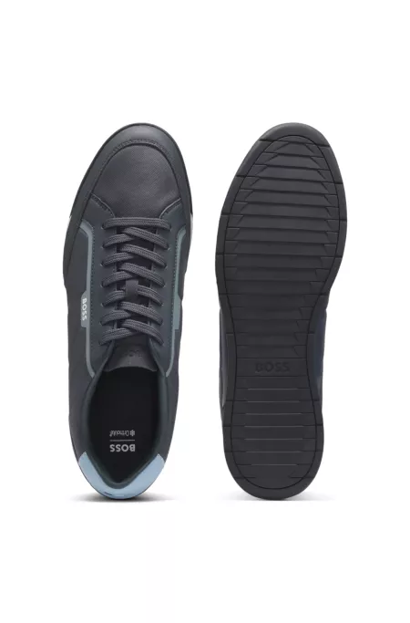 Mixed-material trainers with contrast back tab
