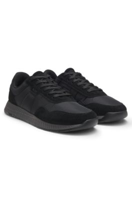 Vadderade sneakers i nylon med mockadetaljer, Svart