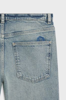 Jeans van getint blauw denim met uitlopende pijpen, Lichtblauw