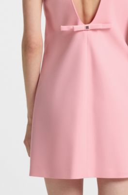 Shiftdress met laag uitgesneden rug en strikdetail, Lichtroze