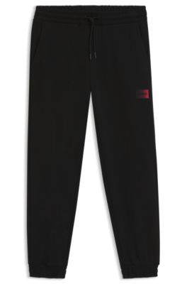 Cotton-terry tracksuit bottoms with gradient logo, Black