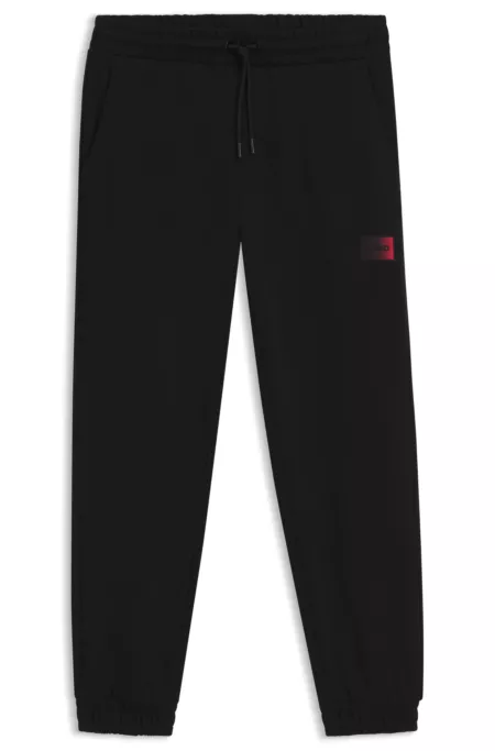 Cotton-terry tracksuit bottoms with gradient logo