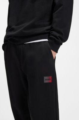 Cotton-terry tracksuit bottoms with gradient logo, Black