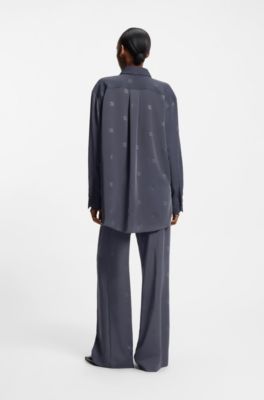 Camicetta oversize con loghi scomposti, A disegni