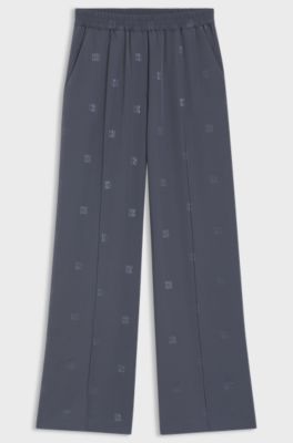 Relaxed-fit trousers with stacked logos, Patterned