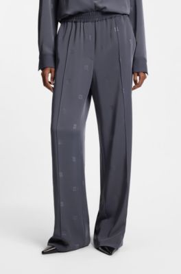 Relaxed-fit trousers with stacked logos, Patterned