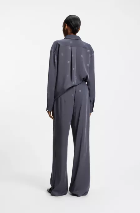 Relaxed-fit trousers with stacked logos