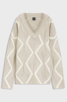 Maglione relaxed fit in lana vergine con lavorazione Aran, Beige a motivi