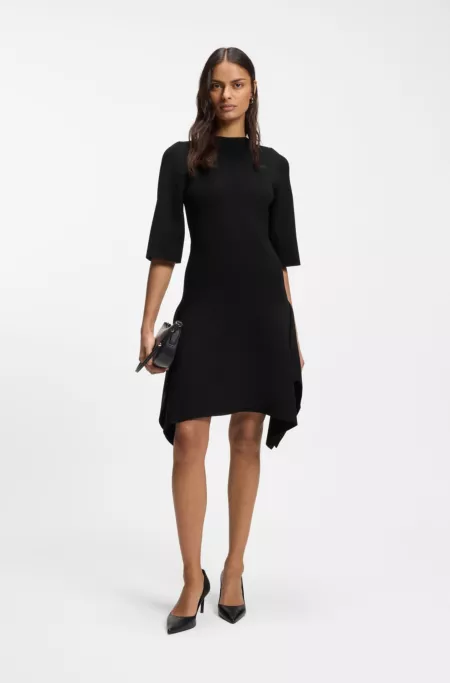 Knitted dress with shaped hemline