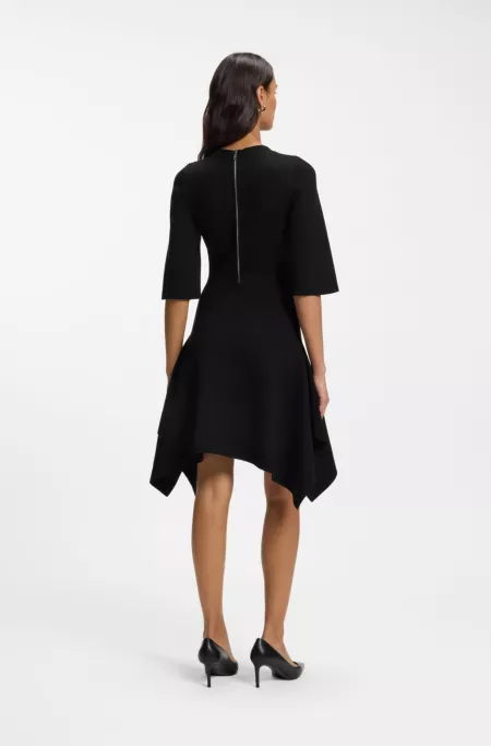 Knitted dress with shaped hemline