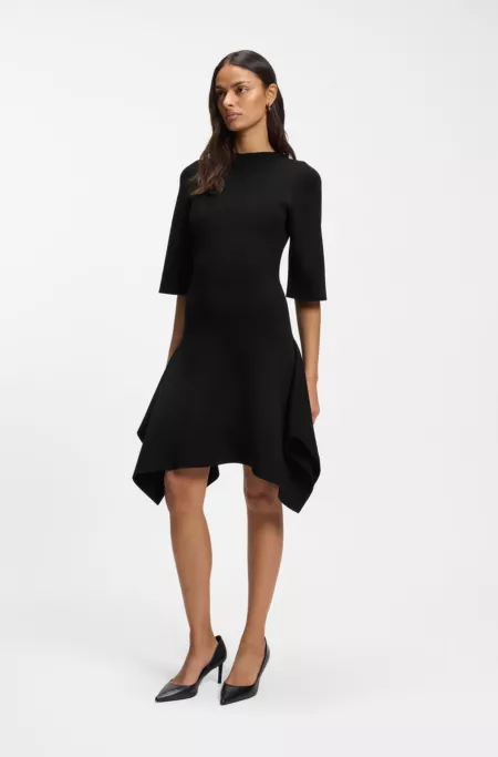 Knitted dress with shaped hemline