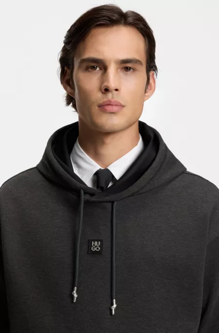 Relaxed-fit hoodie with stacked logo