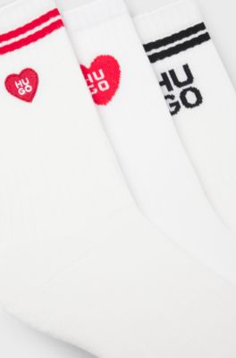 Paquete de tres pares de calcetines cortos en canal&eacute; con logos, Blanco