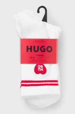 Paquete de tres pares de calcetines cortos en canal&eacute; con logos, Blanco