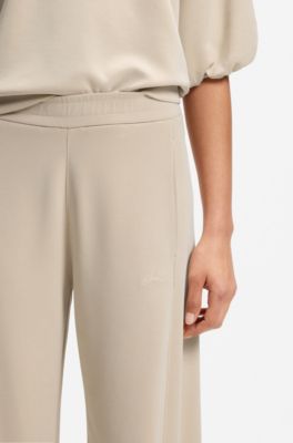 Balloon-fit tracksuit bottoms with logo embroidery, Light Beige