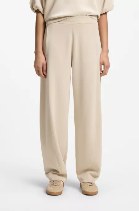 Balloon-fit tracksuit bottoms with logo embroidery