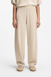 Trainingsbroek met ballonpijpen en logoborduursel, Lichtbeige