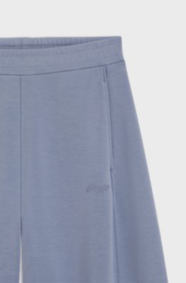 Balloon-fit tracksuit bottoms with logo embroidery, Blue