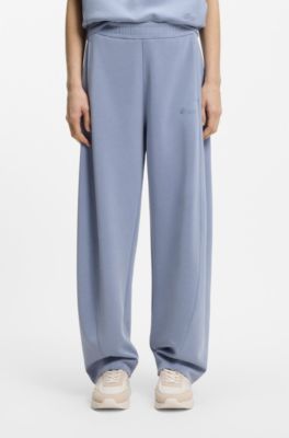 Balloon-fit tracksuit bottoms with logo embroidery, Blue