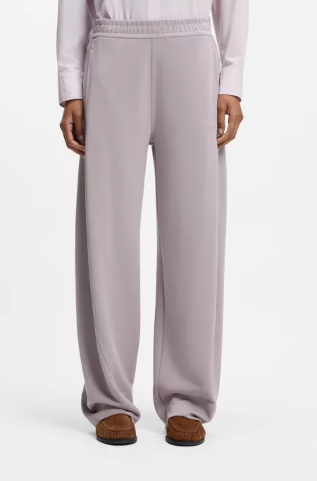 Balloon-fit tracksuit bottoms with logo embroidery