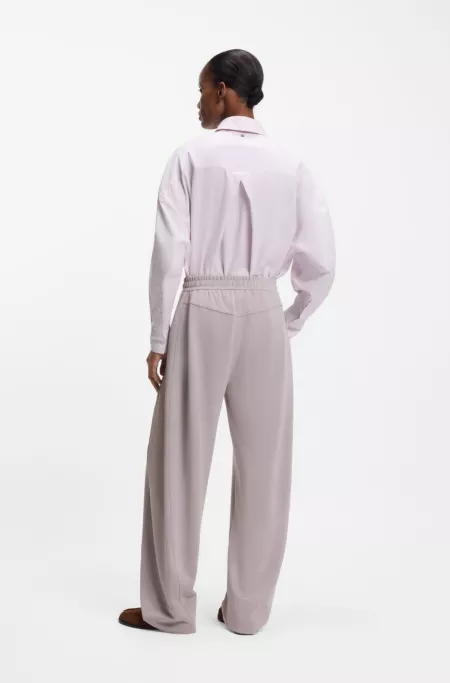 Balloon-fit tracksuit bottoms with logo embroidery