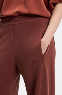 Trainingsbroek met ballonpijpen en logoborduursel, Donkerrood