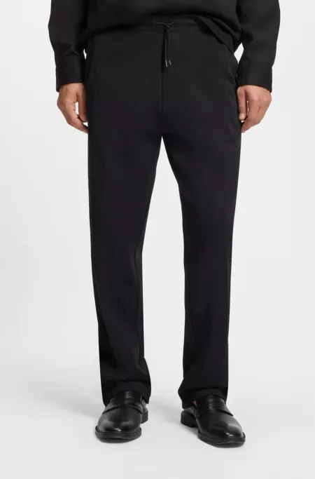 Cotton-blend tracksuit bottoms with drop-needle stripe