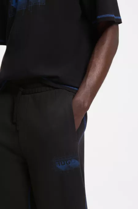 Cotton-terry tracksuit bottoms with logo and contrast stitching