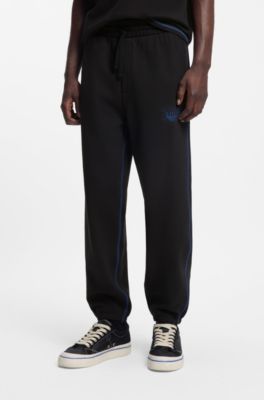 Cotton-terry tracksuit bottoms with logo and contrast stitching, Black